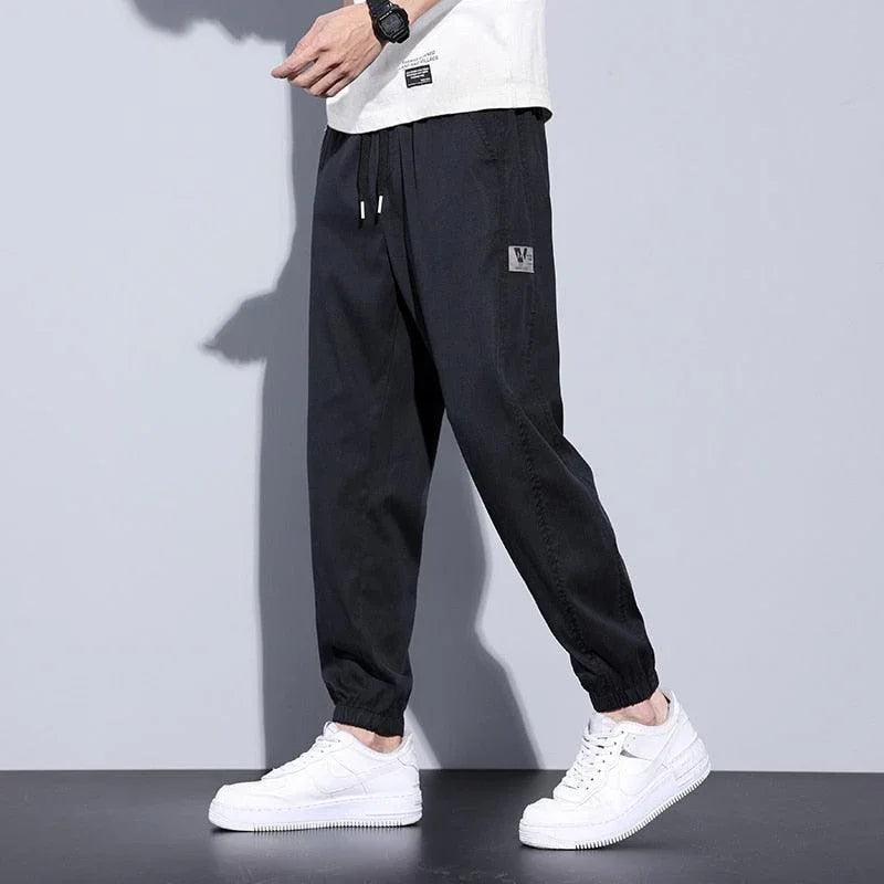 Calça Jogger Masculina - VERSUS / A Calça que Combina Perfeitamente Estilo e Conforto! - ModernLar