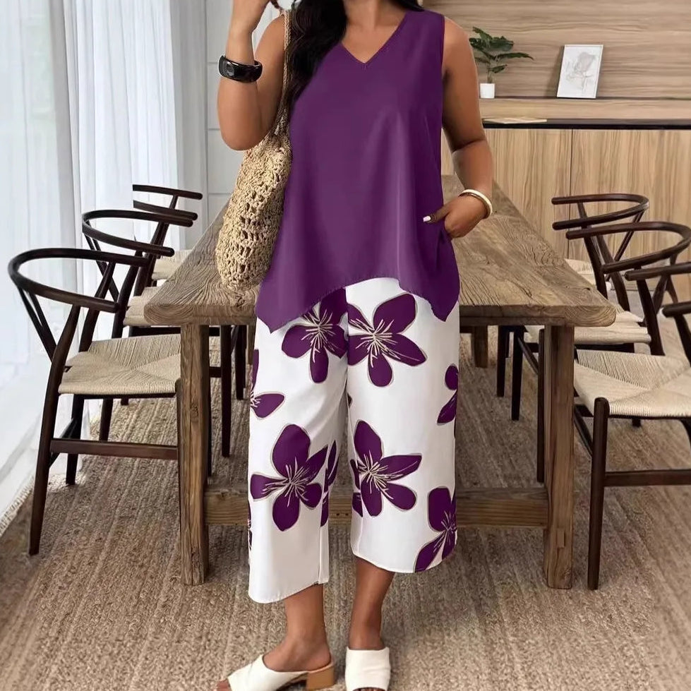 Conjunto Nerina™ com Blusa Assimétrica sem Mangas e Calça Pantacourt de Estampa Floral