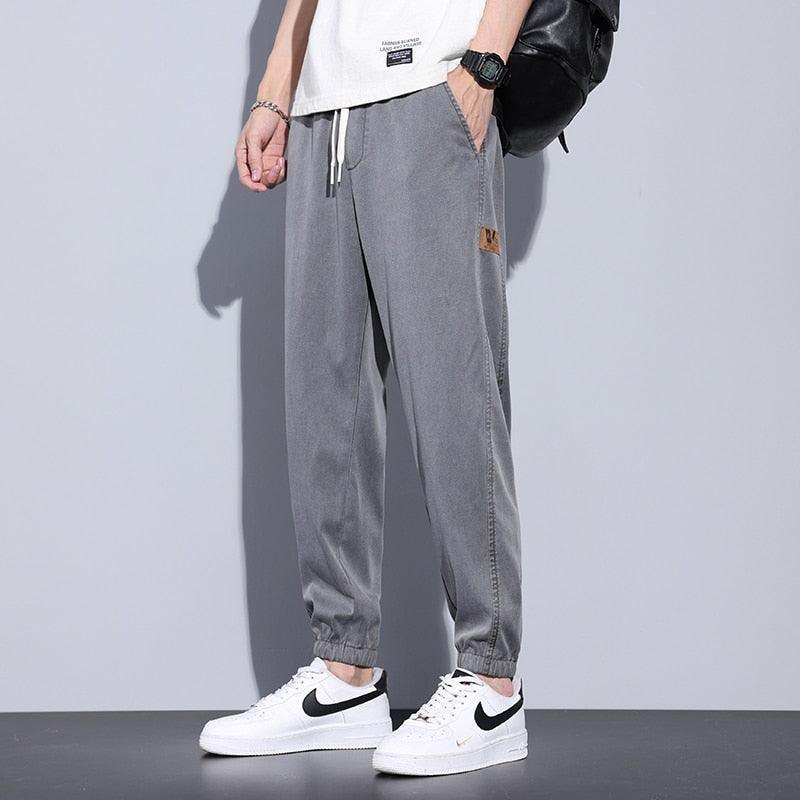 Calça Jogger Masculina - VERSUS / A Calça que Combina Perfeitamente Estilo e Conforto! - ModernLar