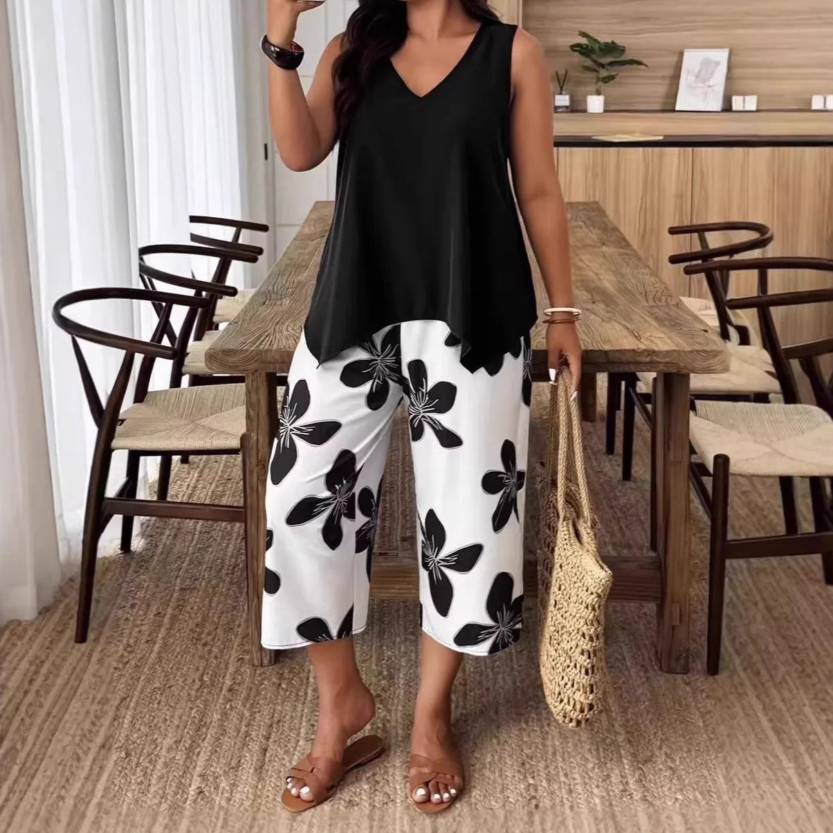 Conjunto Nerina™ com Blusa Assimétrica sem Mangas e Calça Pantacourt de Estampa Floral