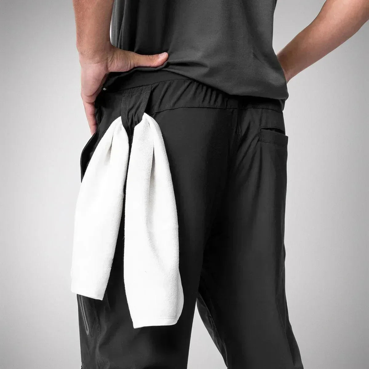 Calça Jogger Performance Titan™ com Suporte Inteligente para Toalha / Liberdade, Estilo e Funcionalidade em Uma Só Peça!