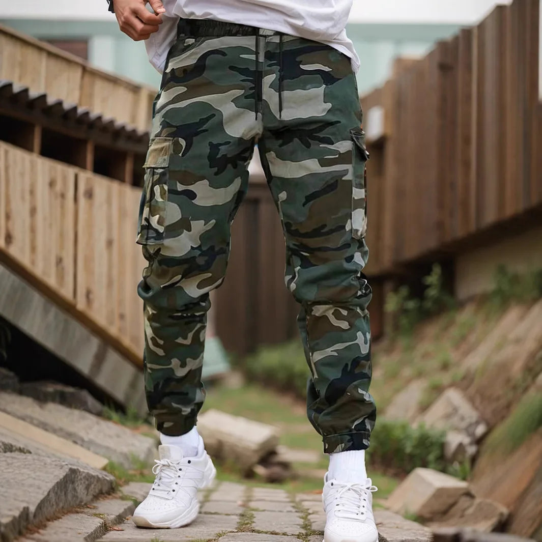 Calça Kaelor™ com Estampa Camuflada e Bolsos Utilitários / Design Pensado Para Unir Conforto e Atitude.