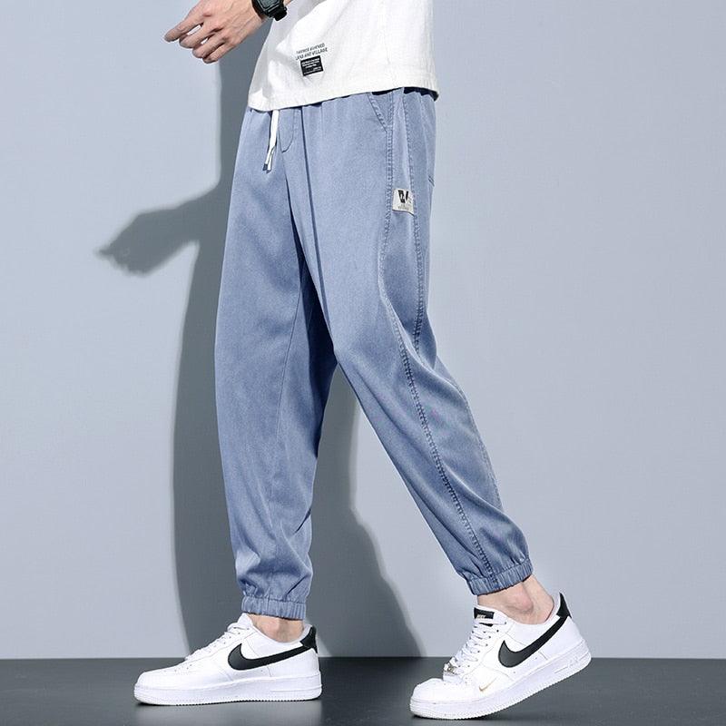 Calça Jogger Masculina - VERSUS / A Calça que Combina Perfeitamente Estilo e Conforto! - ModernLar