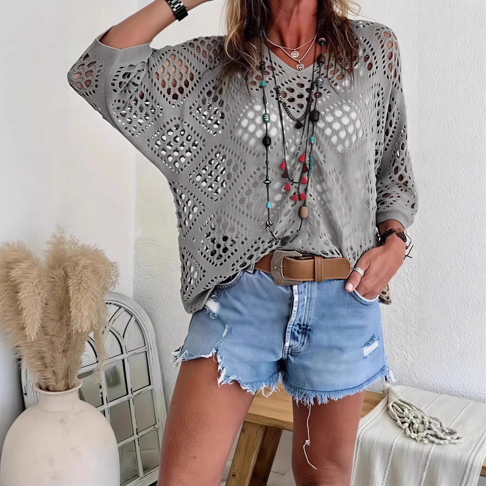 Blusa CityBreeze™ em Tricô Vazado e Modelagem Solta